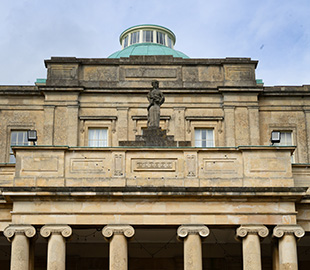 A sculpture of Hygeia atop Pittville Pump Room Cheltenham